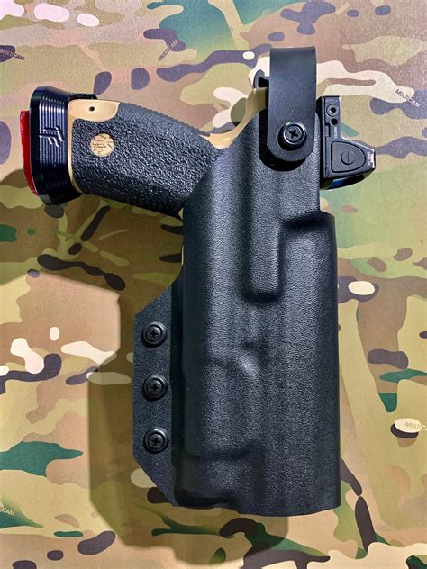 This model is considered a full-sized handgun. . Canik tp9 elite combat holster